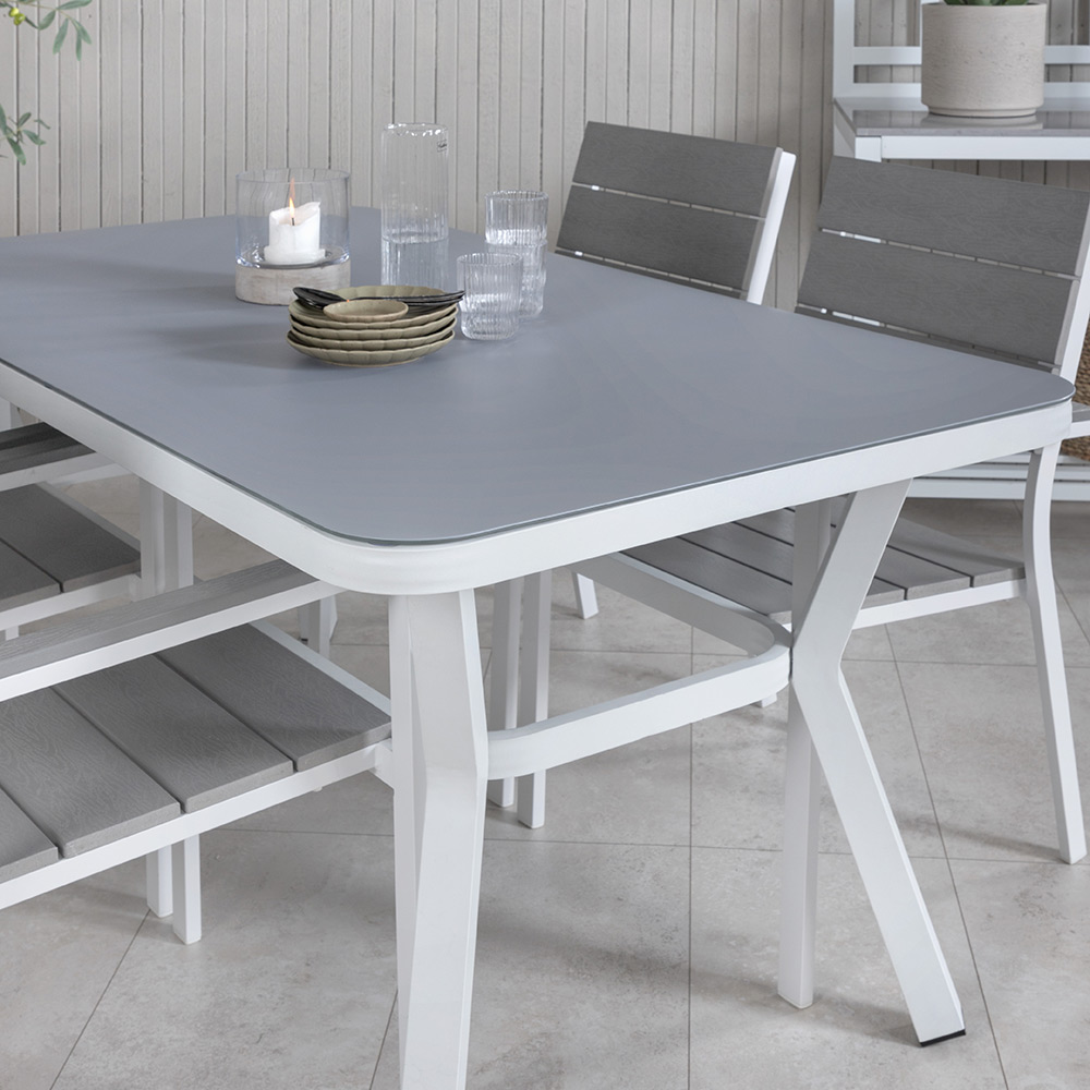 Matgrupp Venture Home Vyn med 4 Lede Stapelbara Matstolar