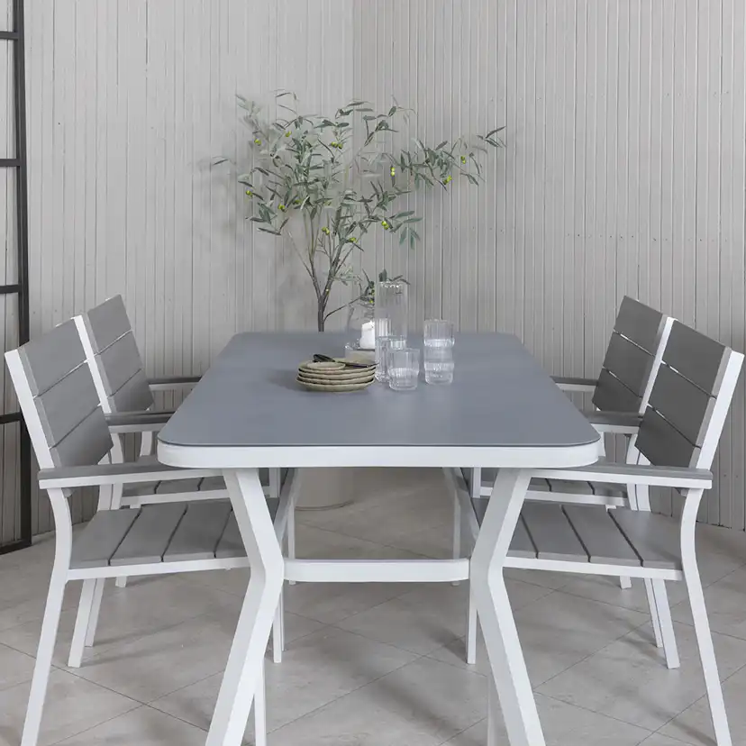 Matgrupp Venture Home Vyn med 4 Lede Stapelbara Matstolar