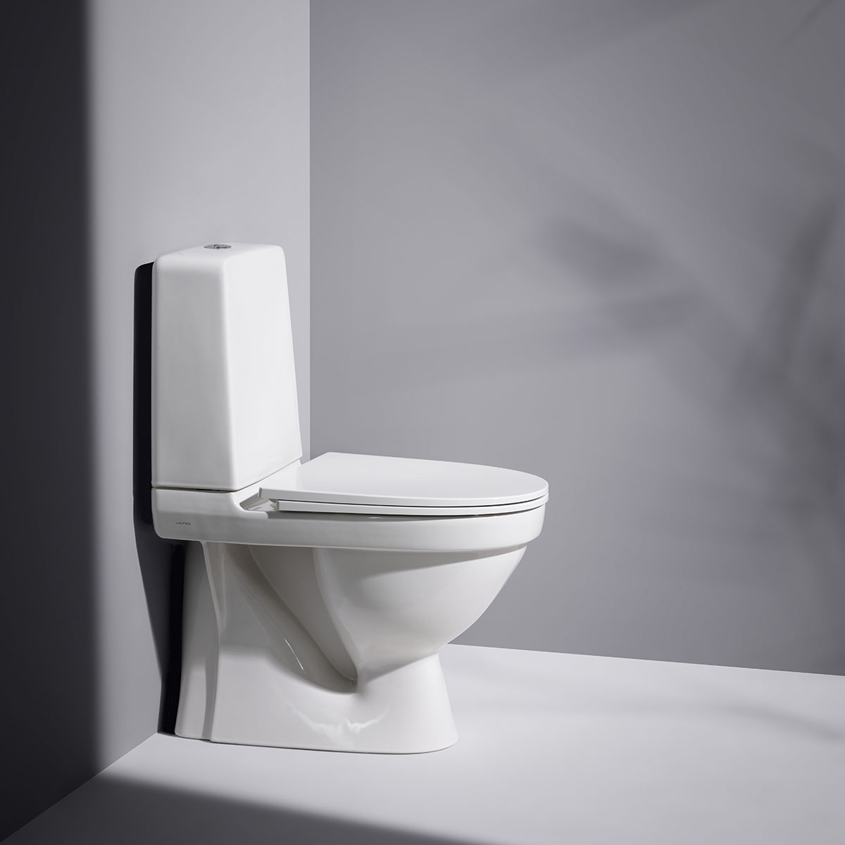 Toalettstol Laufen Kompas 825153 Rimless för Limning inkl Mjuksits
